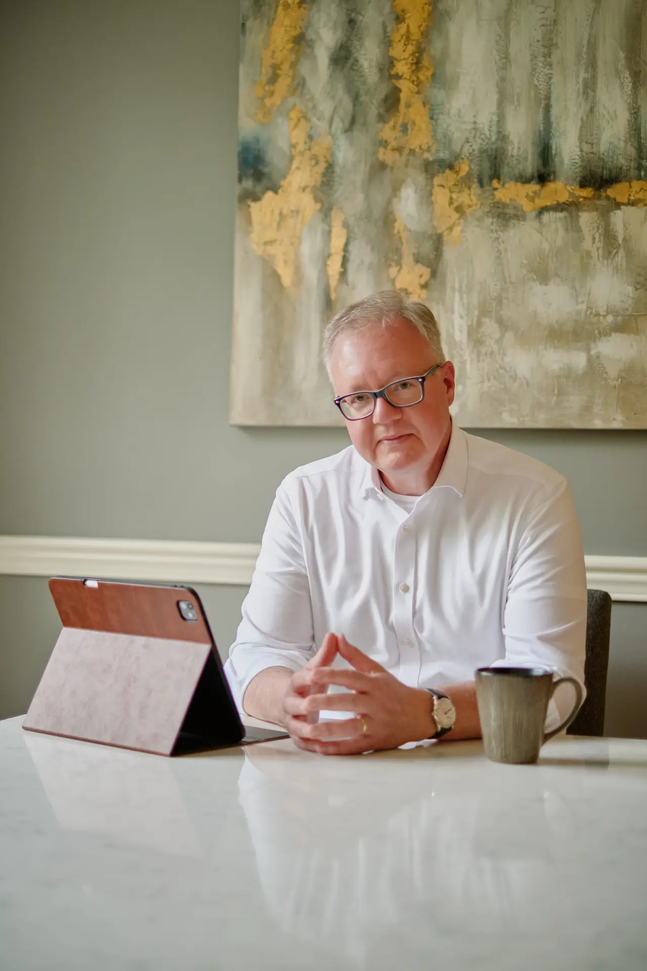 Founder of New Chapter Consulting seated at a table